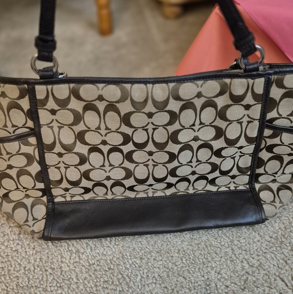 IN GOOD USED CONDITION.. Coach Tan Signature Canvas Tote with Brown Leather Trim - Picture 4 of 14
